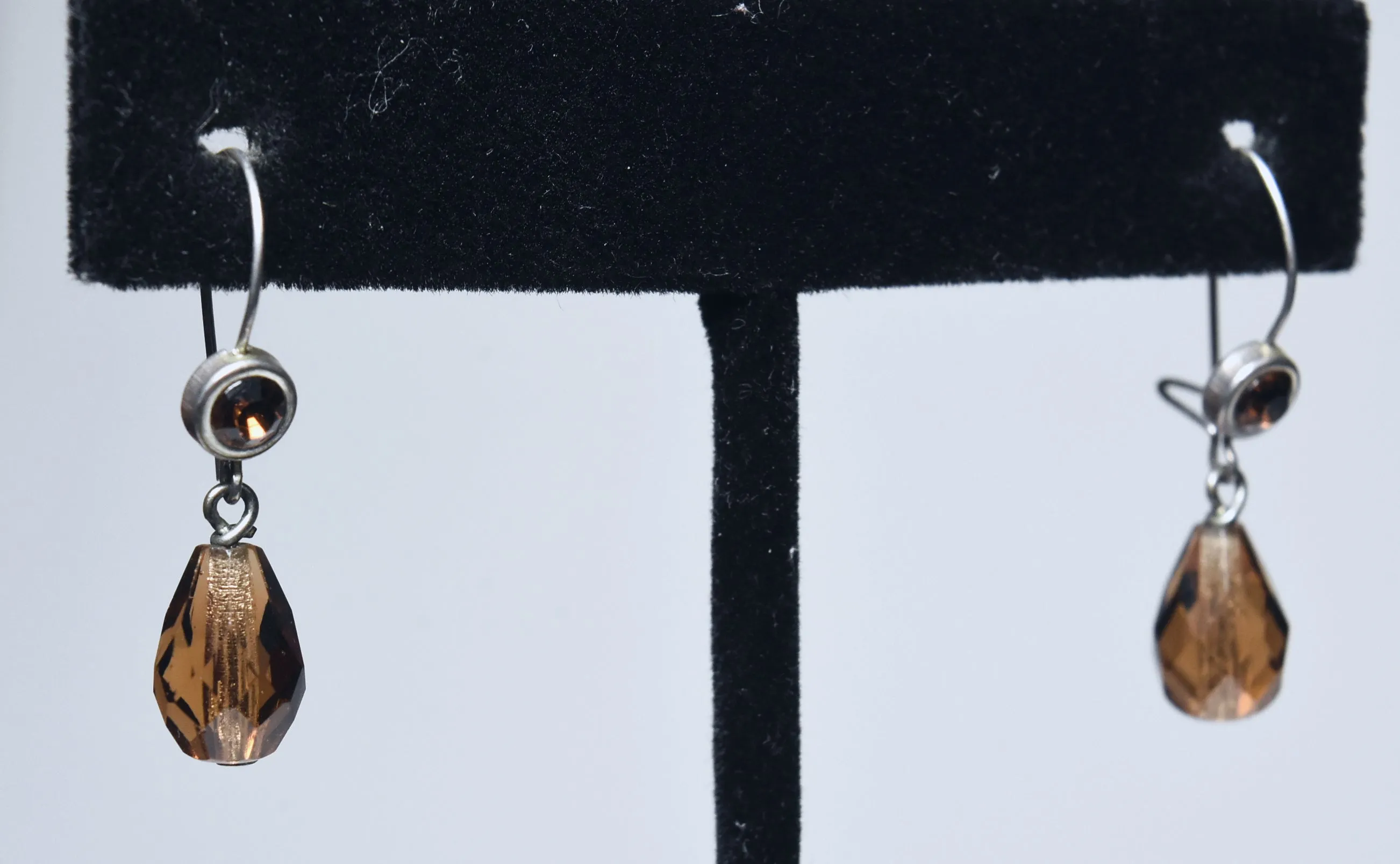 Pair of Faceted Brown Glass and Silver Tone Metal Earrings